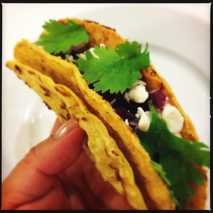 Braised beef cheek, farmer cheese, braised cipollini, in a crunchy corn tortilla wrapped in a soft corn tortilla.  Is it a taco, or is it a crime against humanity?